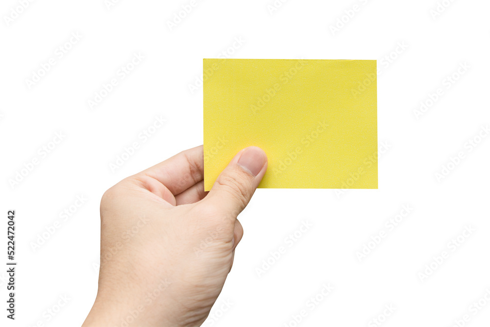 Hand holding yellow paper isolated on white with clipping path. Hand holding yellow paper isolated on white with clipping path.