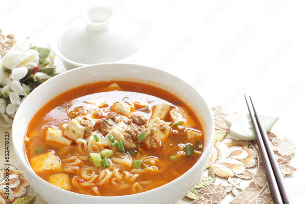 Fusion food, Chinese mapo tofu and ramen noodles in white bowl Fusion food, Chinese mapo tofu and ramen noodles in white bowl