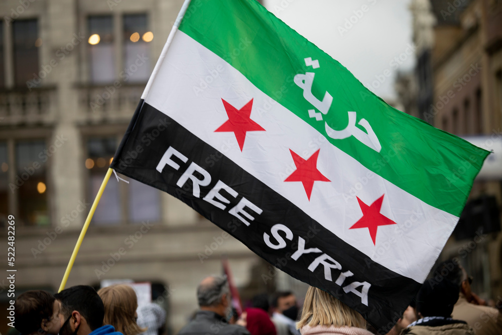 Φωτογραφία Waving flag of the Syrian Arab Republic in Amsterdam. 2021 05 22