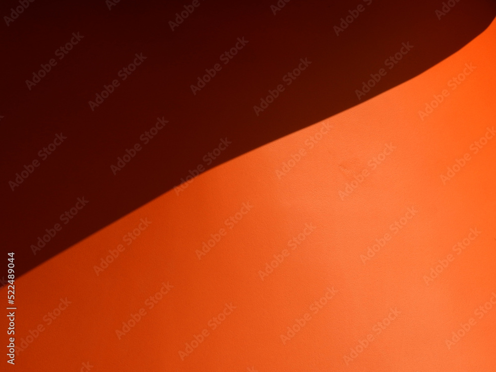 abstract shadow on orange stucco texture background abstract shadow on orange stucco texture background