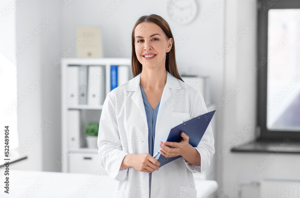 © Syda Productions - medicine, healthcare and profession concept - smiling female doctor with clipboard at hospital © Syda Productions - medicine, healthcare and profession concept - smiling female doctor with clipboard at hospital