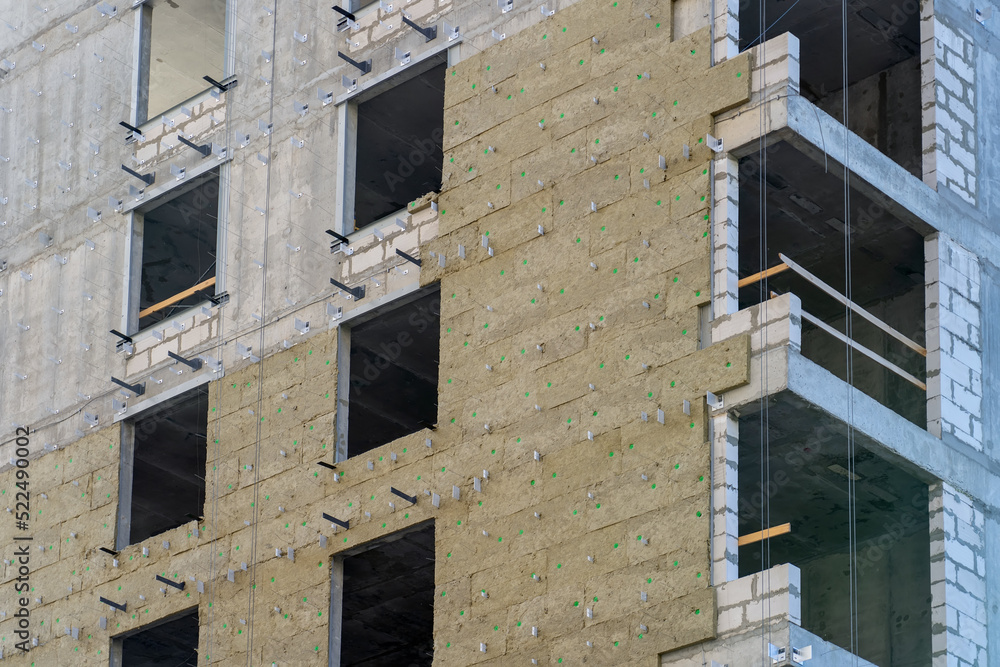 Installation of external wall thermal insulation with rock wool