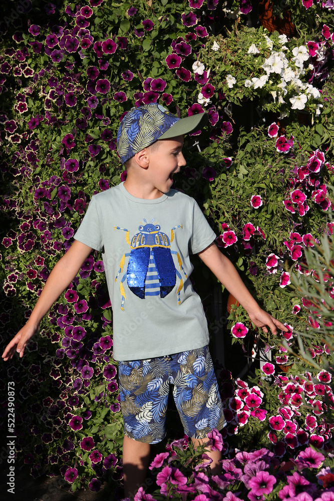 Fashion kid, boy, child in Moscow city, Russia. Summer stylish look for ...