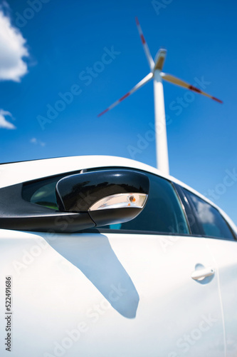 Parked electric car with windmill