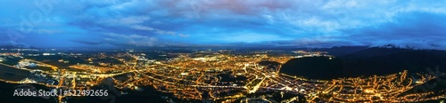 Aerial drone view of Brasov at night, Romania