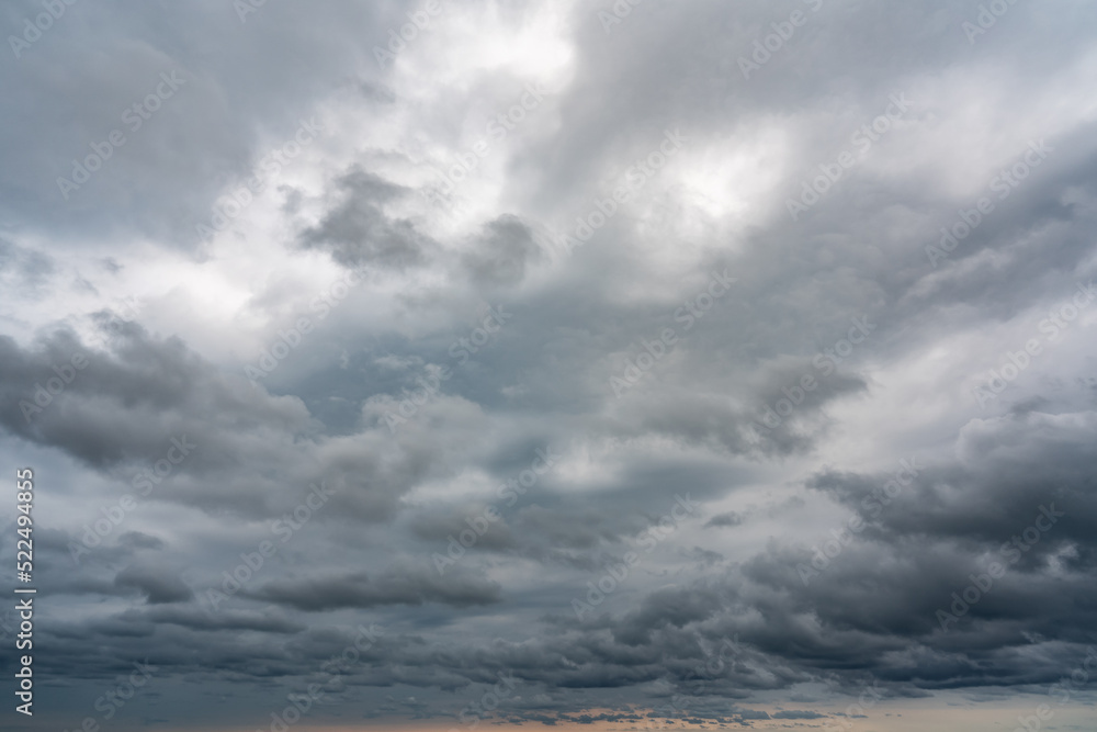 Dark cumulus thunderstorm clouds background Dark cumulus thunderstorm clouds background