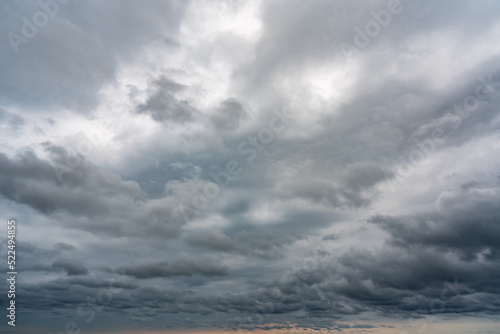 Dark cumulus thunderstorm clouds background