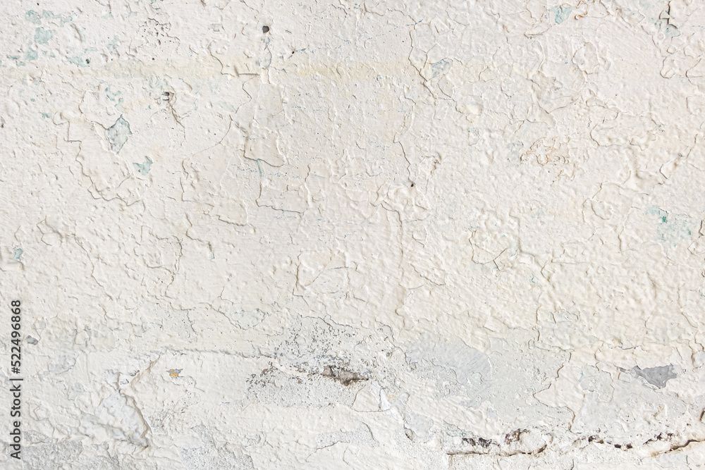 abstract background of an old shabby painted white wall close up abstract background of an old shabby painted white wall close up