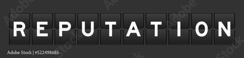 Black color analog flip board with word reputation on gray background