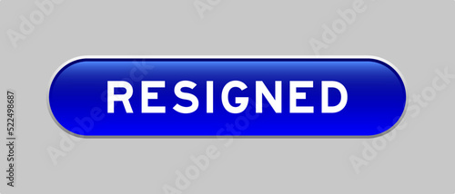 Blue color capsule shape button with word resigned on gray background