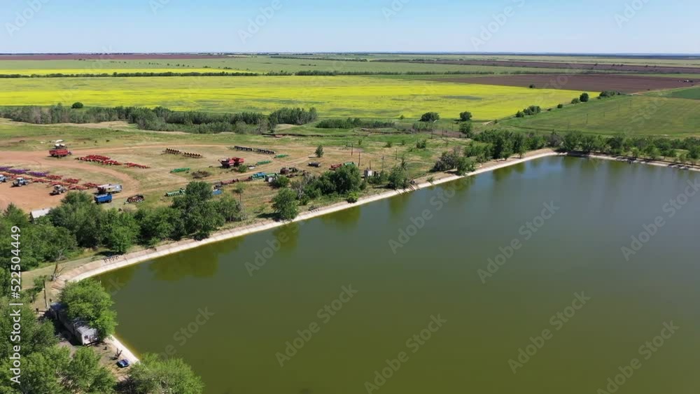 HD. An artificial lake as a source of water for agriculture in the middle of the plantation. HD. An artificial lake as a source of water for agriculture in the middle of the plantation.