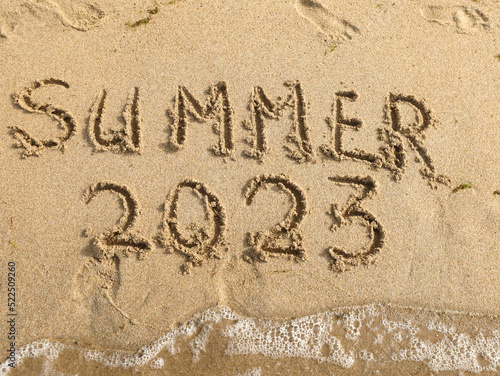 Summer lettering on the beach.