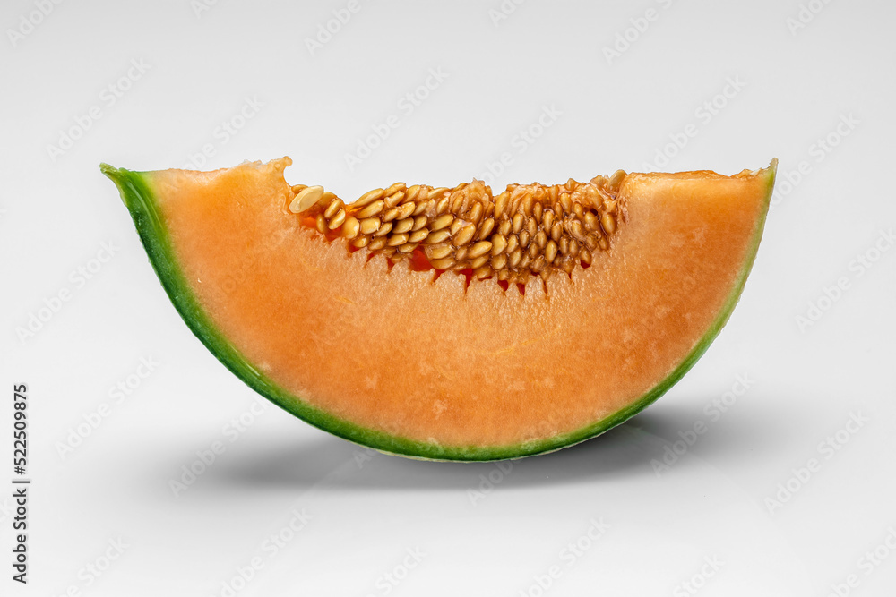 sliced cantaloupe melon. Raw Organic Tuscan Melon Cantaloupe isolated on white background, banner, menu, recipe place for text, top view sliced cantaloupe melon. Raw Organic Tuscan Melon Cantaloupe isolated on white background, banner, menu, recipe place for text, top view