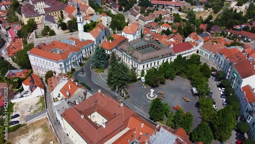 Veszprem, Hungary - 4K flying over the medieval district of Veszprem Ovaros square on a bright summer day with clear blue sky photo