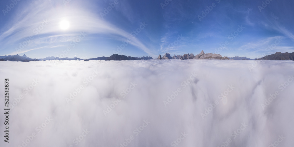 Clouds against mountains and blue sky Clouds against mountains and blue sky