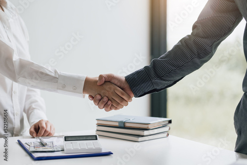 Wallpaper Mural Handshake. Businessman shaking hands with coworker and agreeing business partnership. Torontodigital.ca
