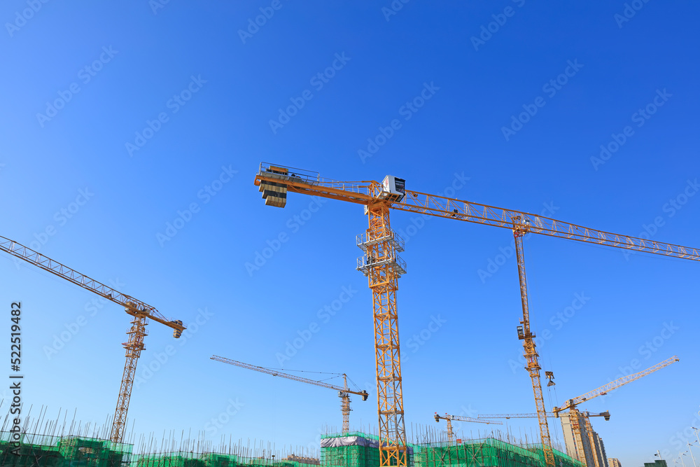 the construction worker's tower crane, Residential buildings are under construction