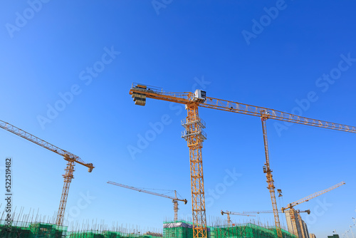 the construction worker's tower crane, Residential buildings are under construction