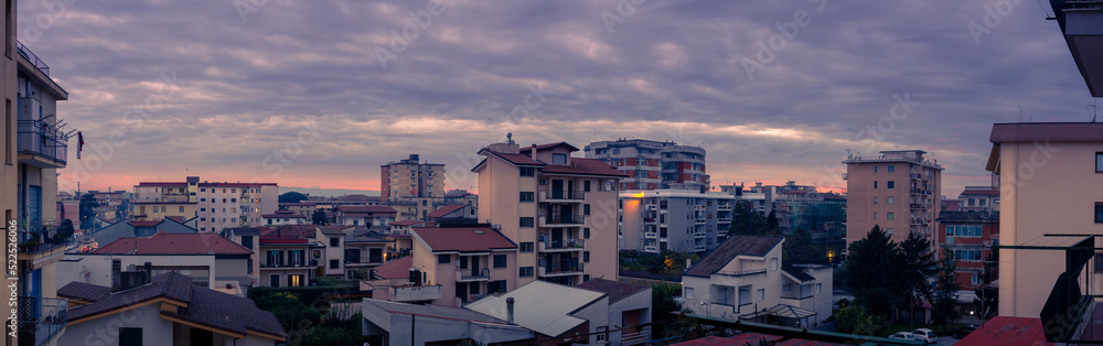 panoramica city skyline with clouds in bad weather of Aversa at sunset