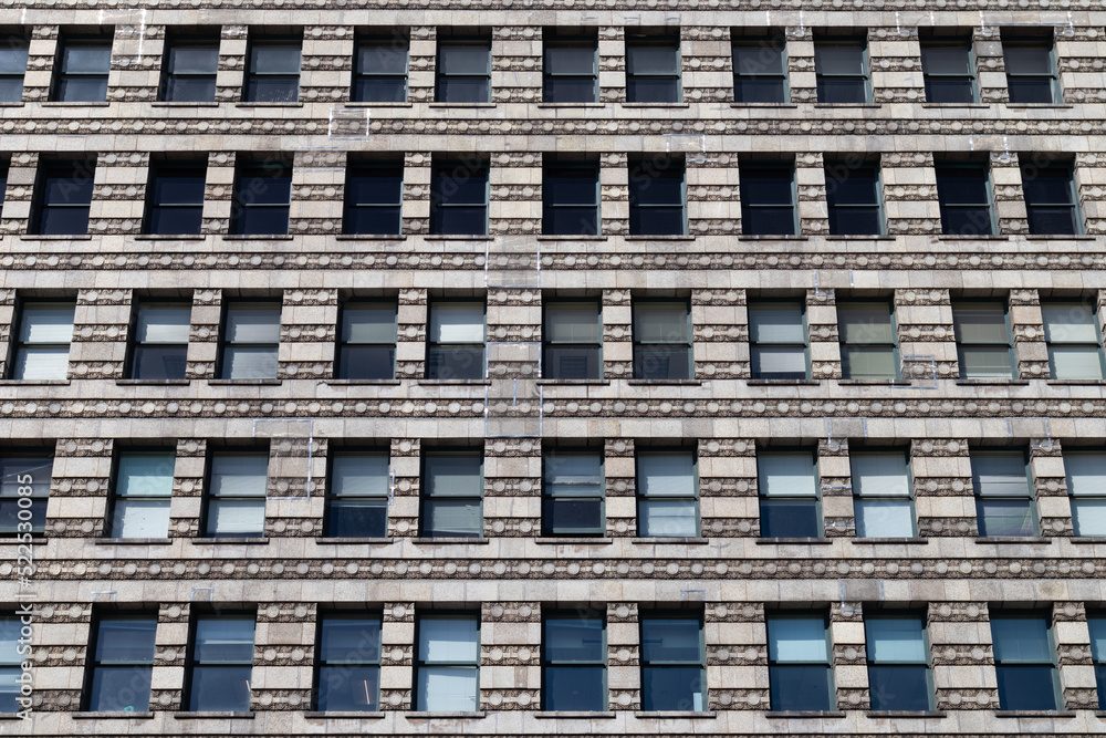 Generic Stone Exterior of an Old Skyscraper Office Building in Chicago Generic Stone Exterior of an Old Skyscraper Office Building in Chicago