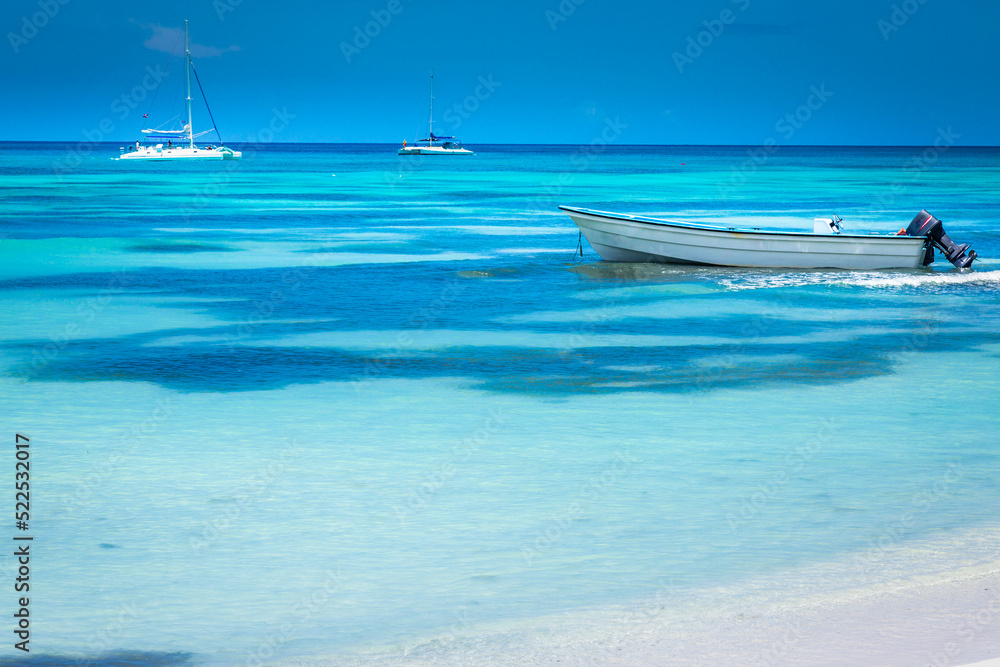 Tropical paradise: idyllic beach with boats, Punta Cana, Dominican Republic