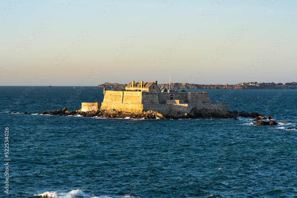 Fortress on the Manche sea, sunset view from Saint-Malo of France 