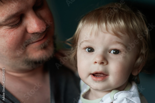 closeup portrait of dad and toddler