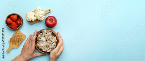 Healthy eating ingredients vegetables, fruits and superfood. Nutrition, diet, vegan food concept. Flat lay. Blue background. Copy space