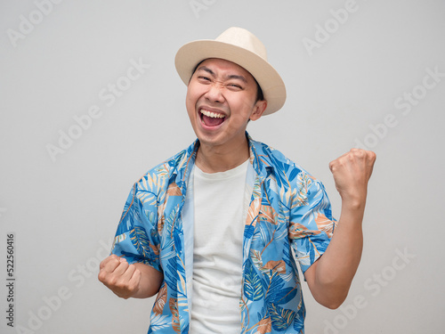 Young man beach shirt wear hat appreciate happy with holiday