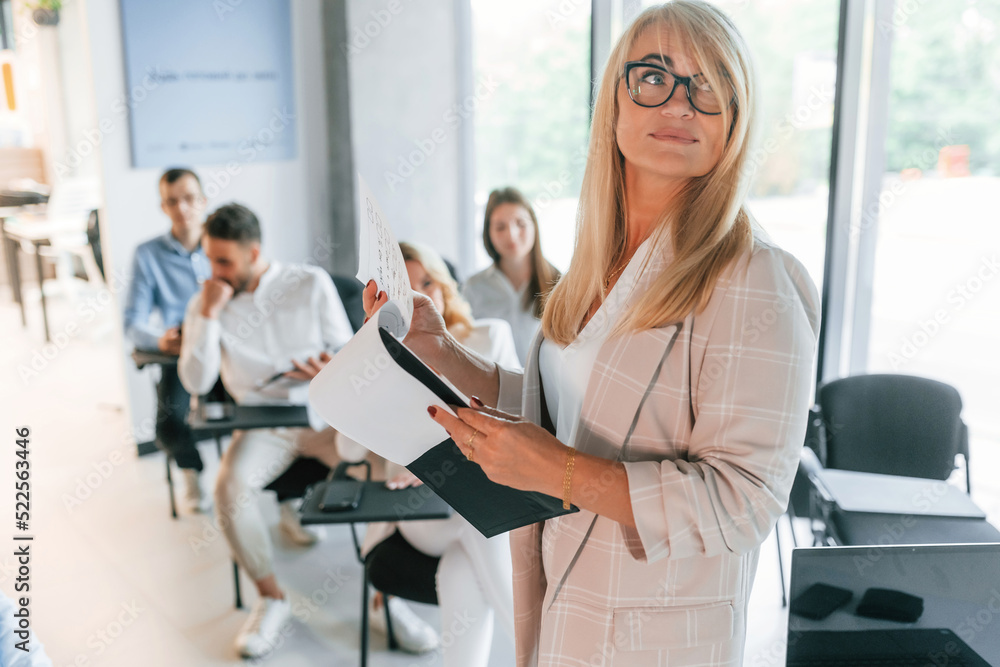 Conception of education and master class. Group of professional business people is in the office Conception of education and master class. Group of professional business people is in the office