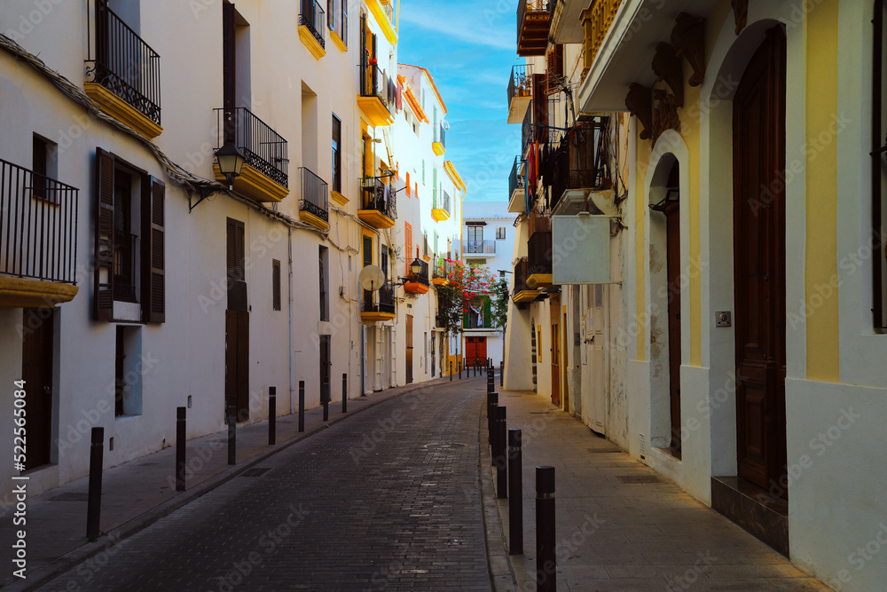 Typical street of the old town of Ibiza Town, in Balearic Islands, Spain