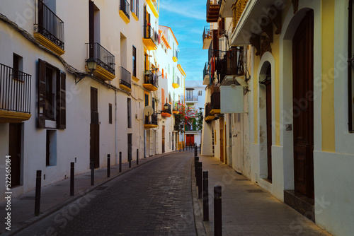 Typical street of the old town of Ibiza Town, in Balearic Islands, Spain
