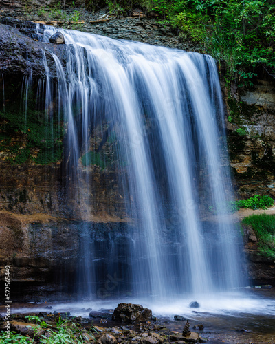 Wilke Glen and Cascade Falls in Osceola  Wisconsin during summer. Selective focus  background blur and foreground blur. 