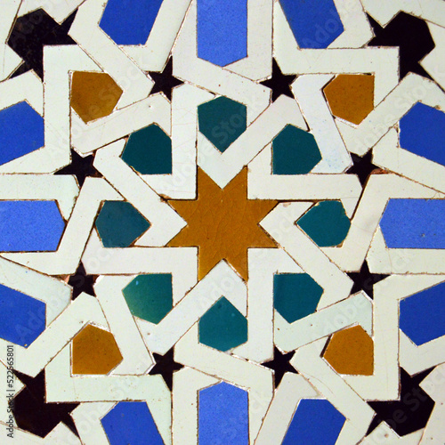 Geometry and colour. Al Andalus tiling (alicatados) in the Alcazar of Seville, Andalusia, Spain. Tiles of Al Andalus photo