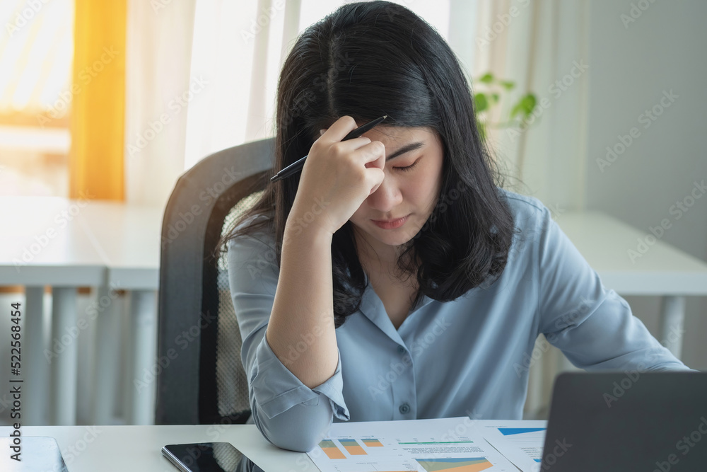 Concept Burnout Syndrome. Business Woman feels uncomfortable working. Which is caused by stress, accumulated from unsuccessful work And less resting body. Consult a specialist psychiatrist. Concept Burnout Syndrome. Business Woman feels uncomfortable working. Which is caused by stress, accumulated from unsuccessful work And less resting body. Consult a specialist psychiatrist.