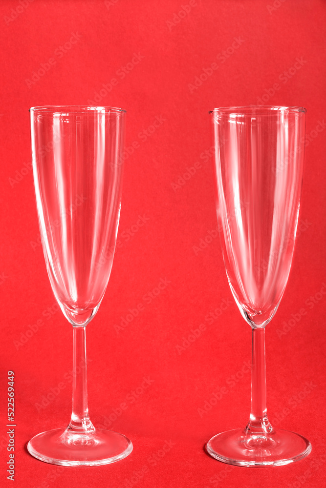 Champagne glasses on red Champagne glasses on red