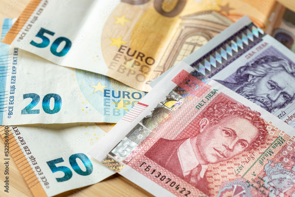 Bulgarian lev next to the common currency of the European Union, the Euro, Concept of Bulgaria accession to the eurozone, economic and political background Bulgarian lev next to the common currency of the European Union, the Euro, Concept of Bulgaria accession to the eurozone, economic and political background