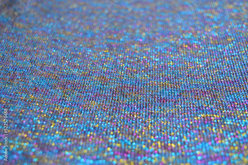 Textile material tinsel structure shiny fabric threads background