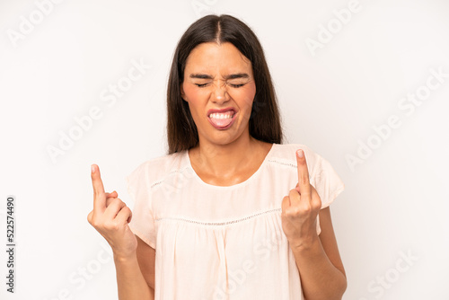 Fényképezés hispanic pretty woman feeling provocative, aggressive and obscene, flipping the