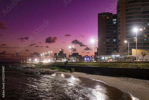 Fim de tarde em paisagem urbana a beira mar photo