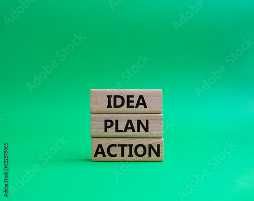 Idea Plan Action symbol. Wooden blocks with words Idea Plan Action. Beautiful green background. Business and Idea Plan Action concept. Copy space.