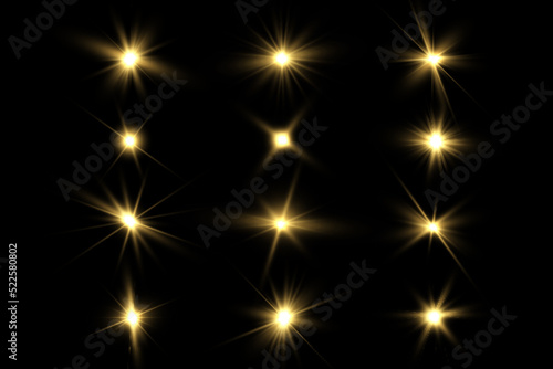Shining golden stars. Light effects, glare, bokeh, glitter, explosion, golden light. Vector illustration.