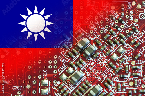 Flag of Taiwan on microchips of a electronic printed board. Taiwan manufacturing chip industry emerges as battlefront in U.S. - China showdown.