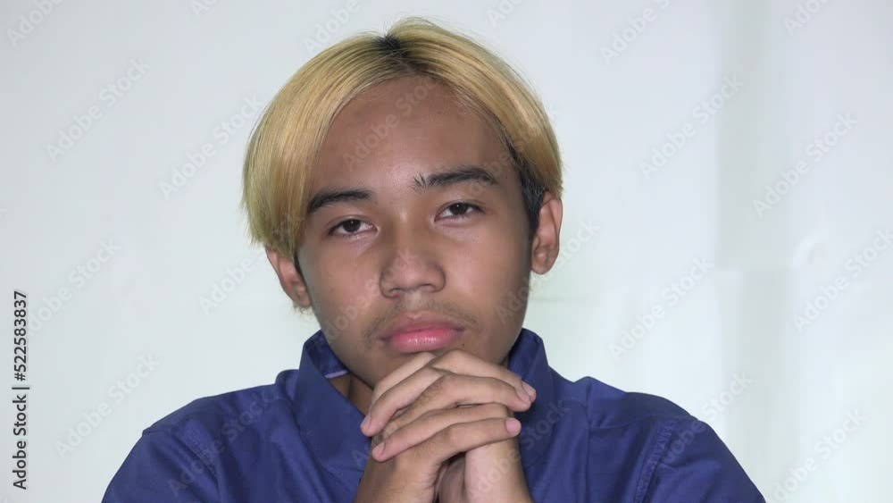 Adult Asian Male Pleading Or Praying Isolated Adult Asian Male Pleading Or Praying Isolated