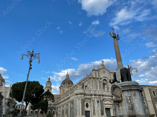 Duomo piazza with elephant statue and obelisk in foreground in Catania, Sicily, Italy