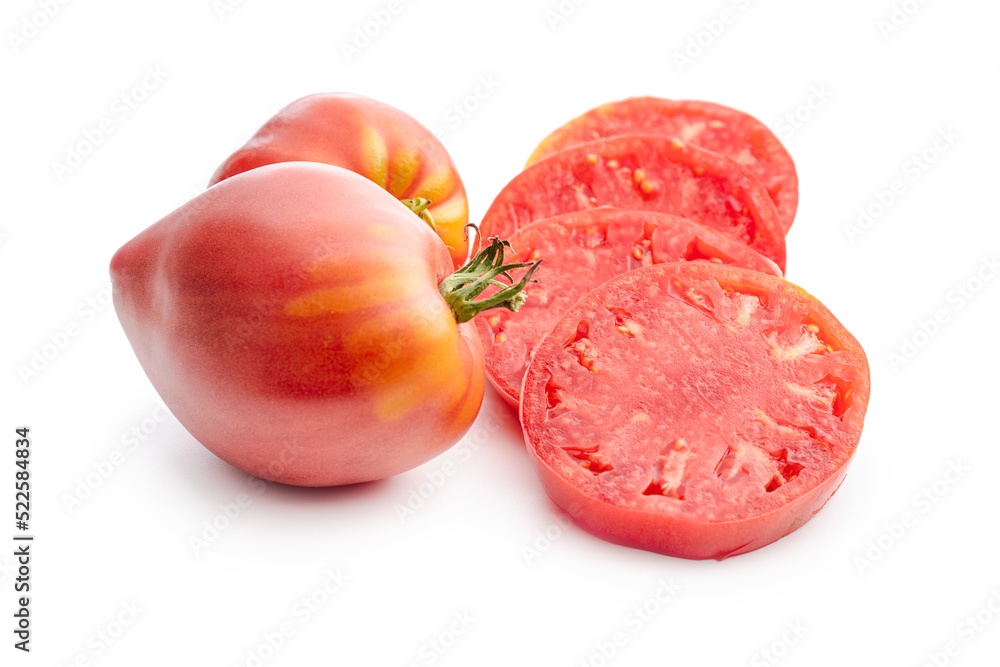 Fototapeta premium Sliced bull heart tomatoes isolated on white background.