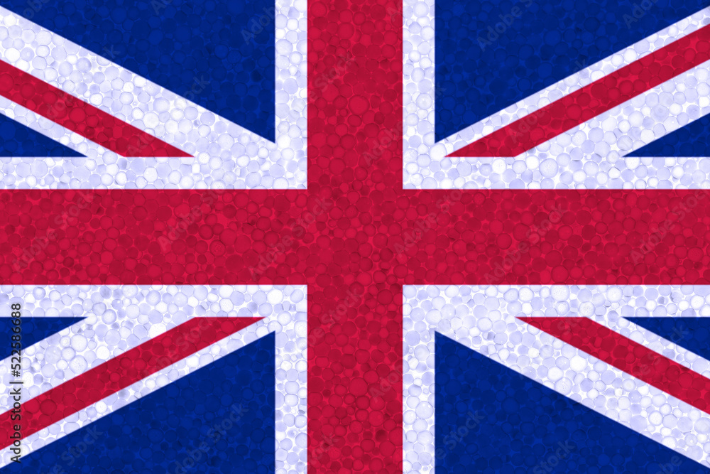 Fototapeta premium United Kingdom flag on styrofoam texture. UK flag painted on the surface of plastic foam