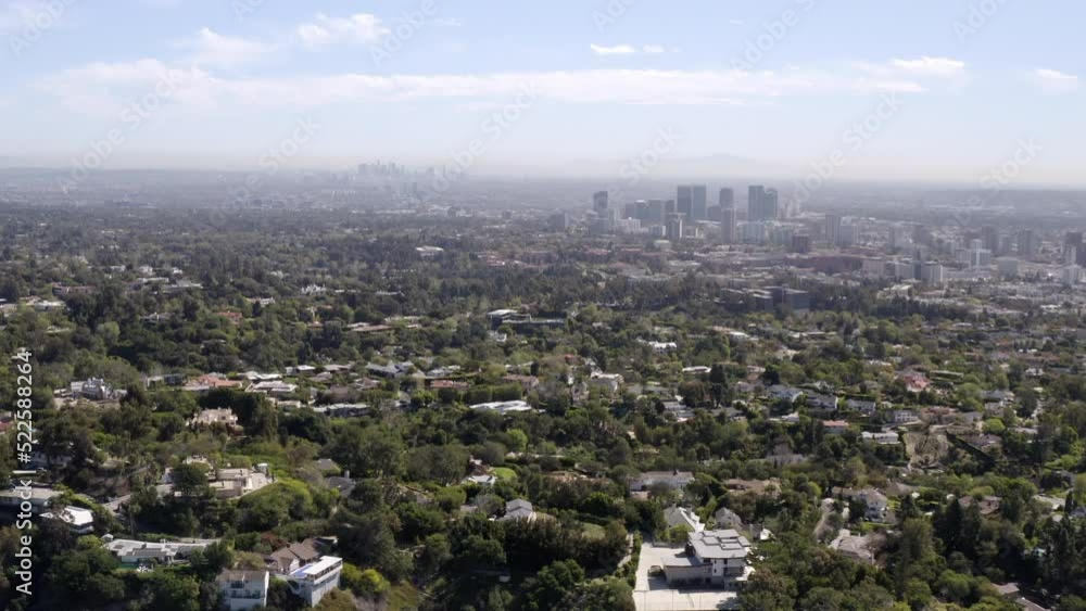 Aerial Shot Of Tall Buildings Against Cloudy Sky, Drone Flying Forward Over City - Los Angeles, California Aerial Shot Of Tall Buildings Against Cloudy Sky, Drone Flying Forward Over City - Los Angeles, California
