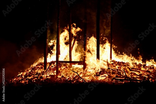 Buergbrennen festival in Luxembourg. Celebrating end of winter beginning of spring by burning mock castles. Red coal and flames photo