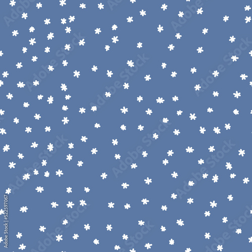 Winter seamless pattern with white snowflakes on blue background. Vector illustration for fabric, textile wallpaper, posters, gift wrapping paper. Christmas vector illustration.